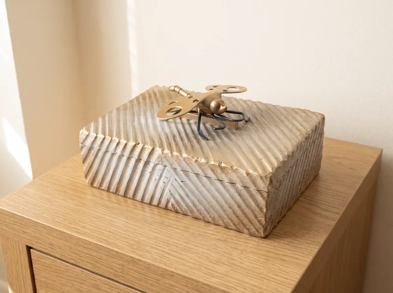 Carved silver box with metal dragonfly